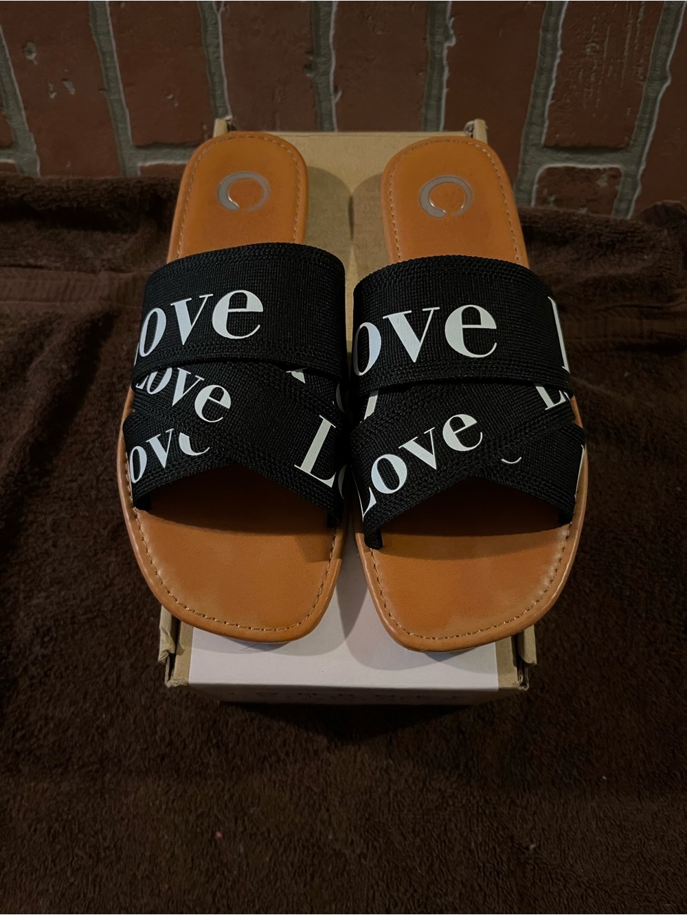 DSW Black 'Love' Crossover Slide Sandals with Tan Footbed